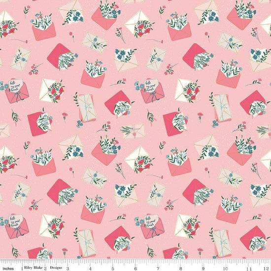 Image of Correspondence Letters Frosting quilting cotton fabric by Beverly McCullough for Riley Blake Designs. Features letters on a pink background. Cute Little Fabric Shop.