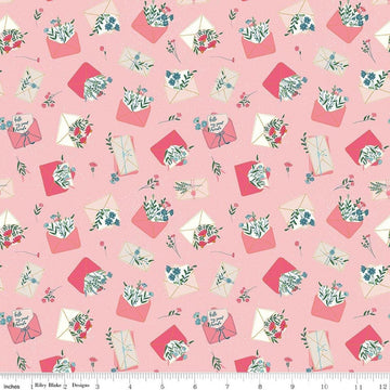 Image of Correspondence Letters Frosting quilting cotton fabric by Beverly McCullough for Riley Blake Designs. Features letters on a pink background. Cute Little Fabric Shop.