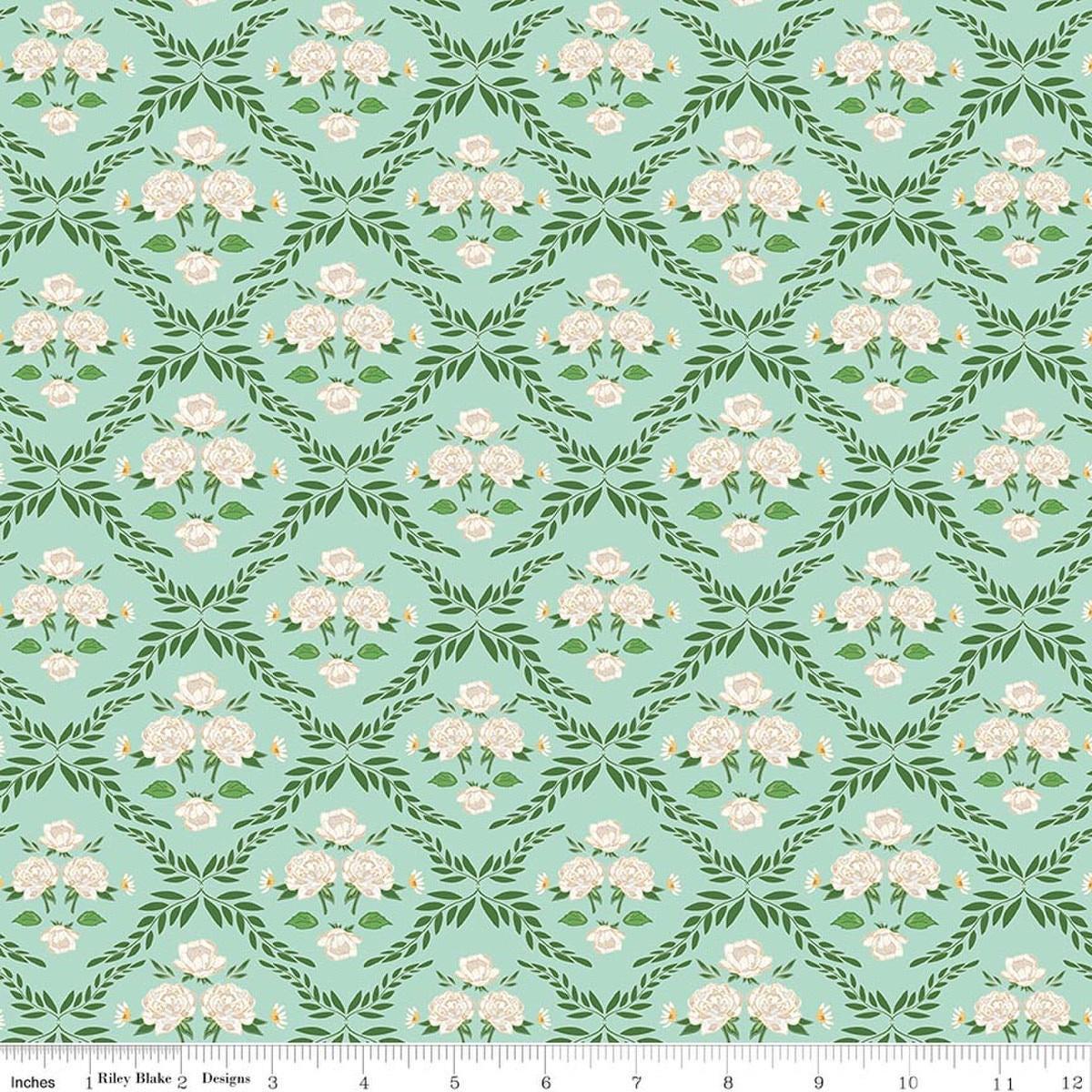 Image of Correspondence Trellis Damask Mint quilting cotton fabric by Beverly McCullough for Riley Blake Designs. Features flowers on a green background. Cute Little Fabric Shop.