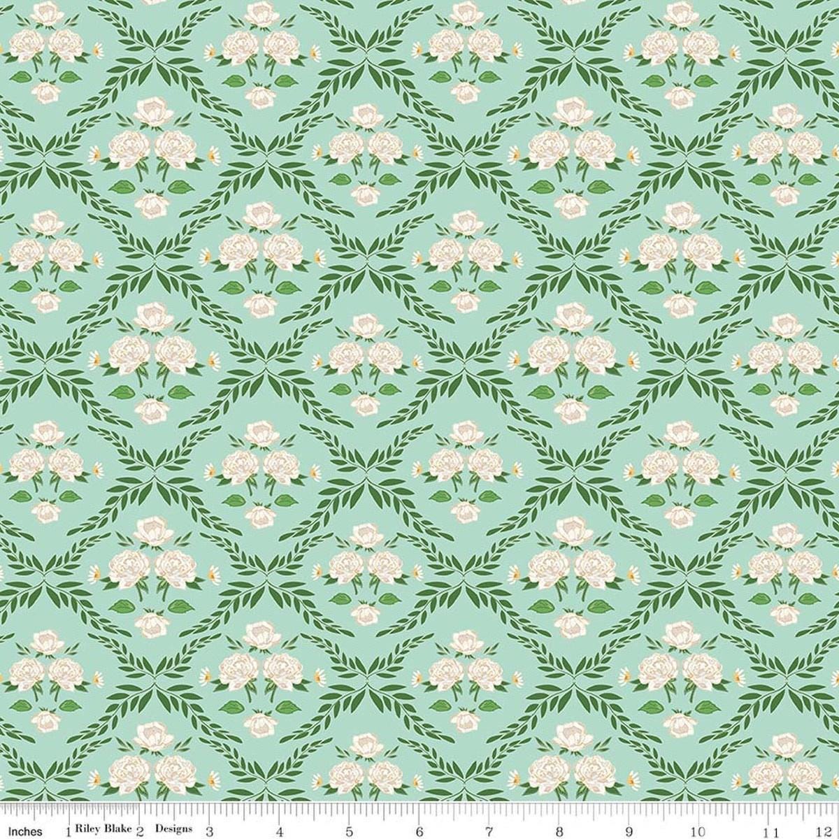 Image of Correspondence Trellis Damask Mint quilting cotton fabric by Beverly McCullough for Riley Blake Designs. Features flowers on a green background. Cute Little Fabric Shop.