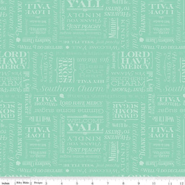 Image of Southern Charm Text Mint quilting cotton fabric by The RBD Designers for Riley Blake Designs. Features words on a green background. Cute Little Fabric Shop.