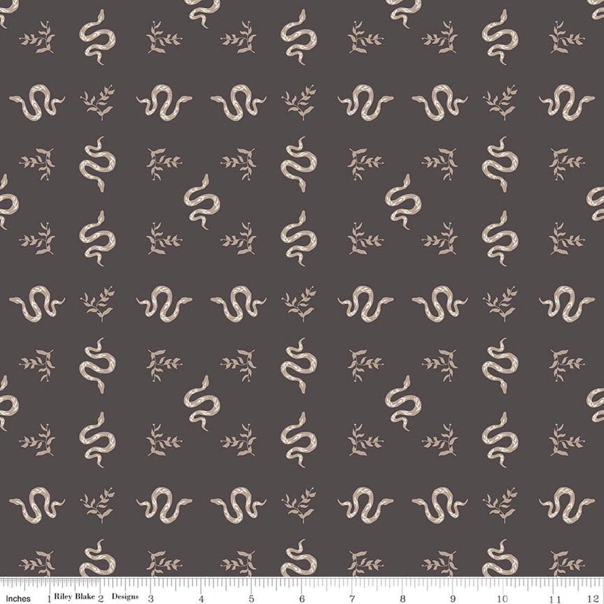 Image of The Apothecary Serpents Charcoal quilting cotton fabric by Amber Elliot for Riley Blake Designs. Features snakes on a black background. Cute Little Fabric Shop.