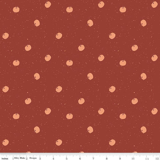 Image of The Apothecary Pumpkin Toss Rust quilting cotton fabric by Amber Elliot for Riley Blake Designs. Features pumpkins on a red background. Cute Little Fabric Shop.