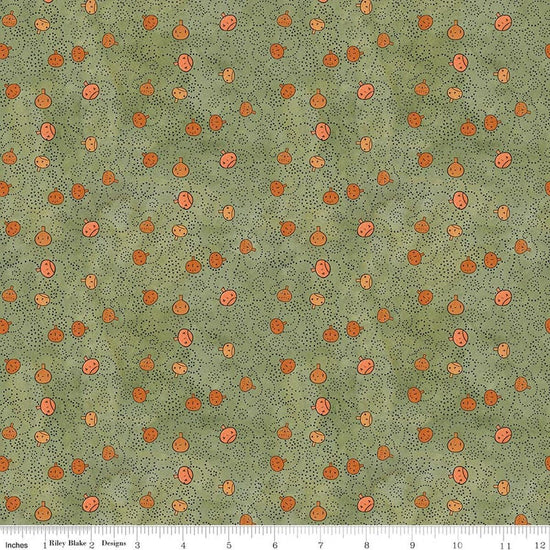 Image of Spooky Pumpkins Green quilting cotton fabric by Teresa Kogut for Riley Blake Designs. Features pumpkins on a green background. Cute Little Fabric Shop.