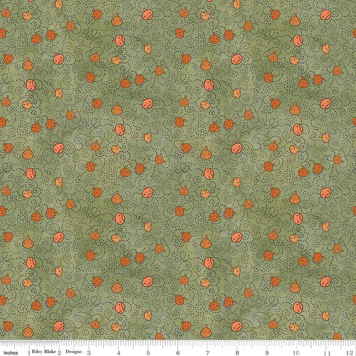 Image of Spooky Pumpkins Green quilting cotton fabric by Teresa Kogut for Riley Blake Designs. Features pumpkins on a green background. Cute Little Fabric Shop.