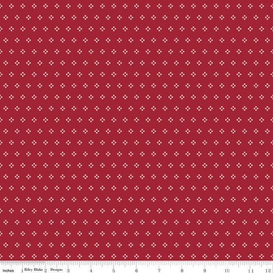 Image of Berry & Sage Eyelet Cherry Tart quilting cotton fabric by Lori Holt for Riley Blake Designs. Features dots on a red background. Cute Little Fabric Shop.