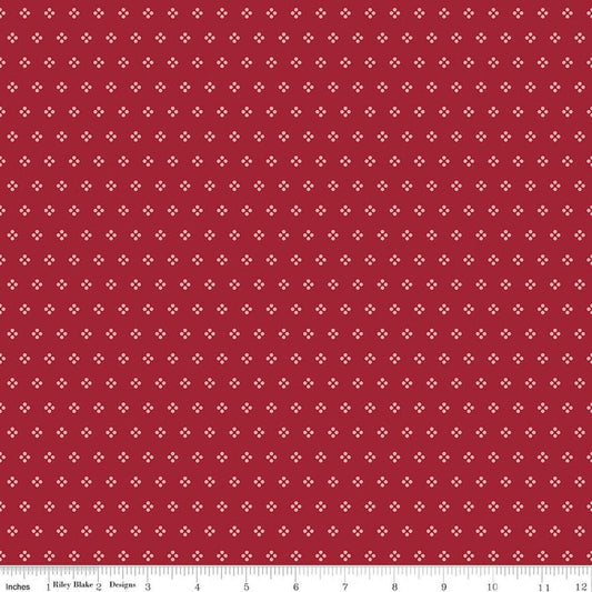 Image of Berry & Sage Eyelet Cherry Tart quilting cotton fabric by Lori Holt for Riley Blake Designs. Features dots on a red background. Cute Little Fabric Shop.