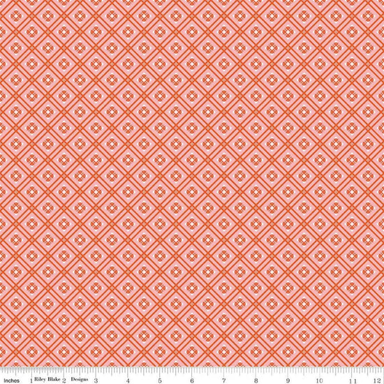 Image of Peach Cobbler Arbor Pink quilting cotton fabric by Lily Ashbury for Riley Blake Designs. Features a geometric pattern on a pink background. Cute Little Fabric Shop.