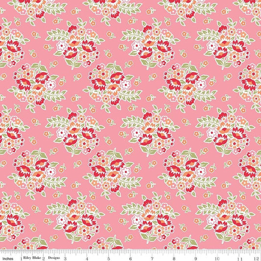 Image of Peach Cobbler Posy Pink quilting cotton fabric by Lily Ashbury for Riley Blake Designs. Features flowers on a pink background. Cute Little Fabric Shop.