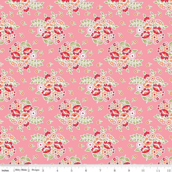 Image of Peach Cobbler Posy Pink quilting cotton fabric by Lily Ashbury for Riley Blake Designs. Features flowers on a pink background. Cute Little Fabric Shop.