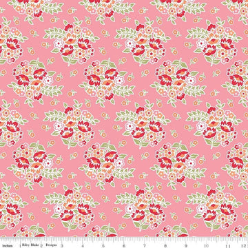 Image of Peach Cobbler Posy Pink quilting cotton fabric by Lily Ashbury for Riley Blake Designs. Features flowers on a pink background. Cute Little Fabric Shop.