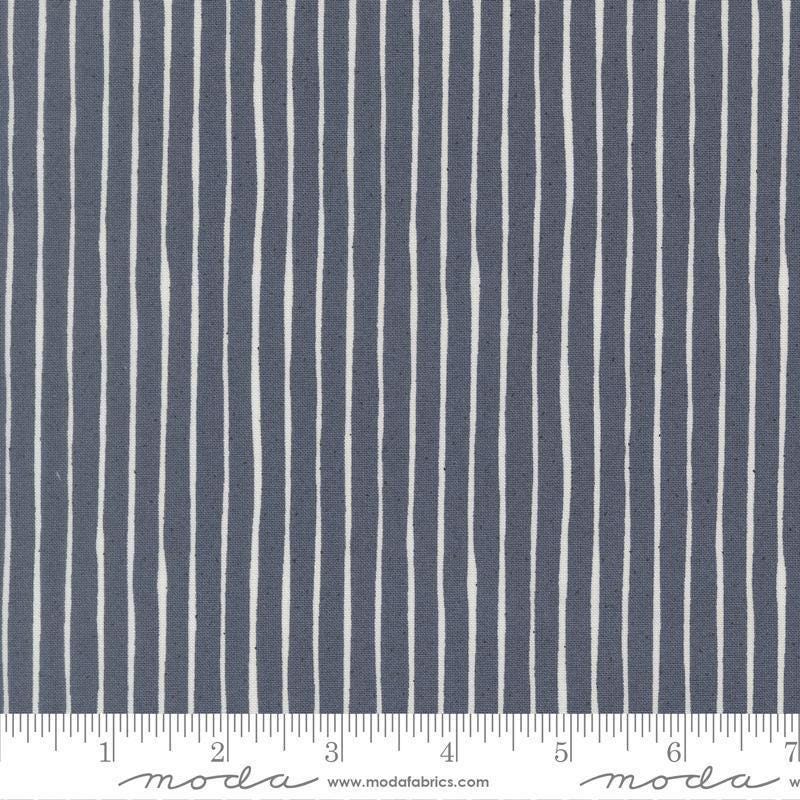 Independence Day Stripes Indigo quilting cotton fabric by Sweetwater for Moda Fabrics. Features stripes on a blue background. Cute Little Fabric Shop.