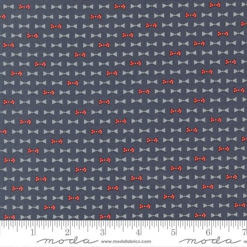 Independence Day Bowties Indigo quilting cotton fabric by Sweetwater for Moda Fabrics. Features bowties on a blue background. Cute Little Fabric Shop.