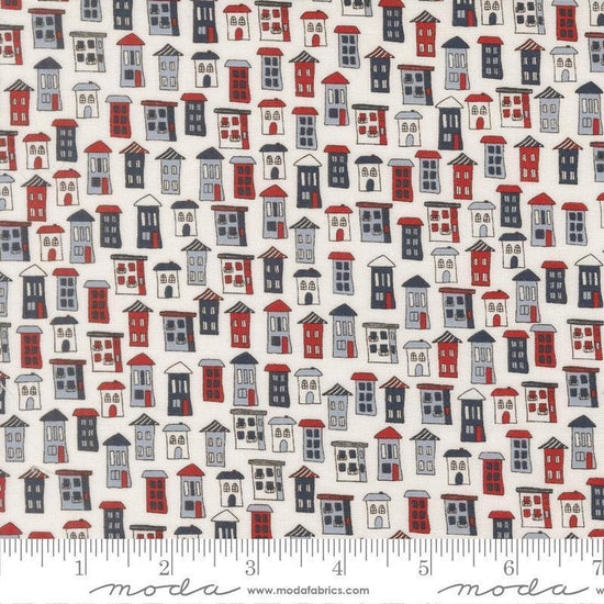Independence Day Houses Vanilla quilting cotton fabric by Sweetwater for Moda Fabrics. Features houses on a white background. Cute Little Fabric Shop.