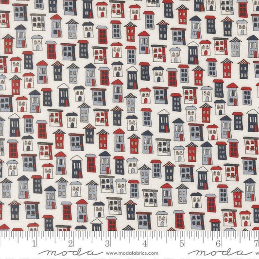 Independence Day Houses Vanilla quilting cotton fabric by Sweetwater for Moda Fabrics. Features houses on a white background. Cute Little Fabric Shop.