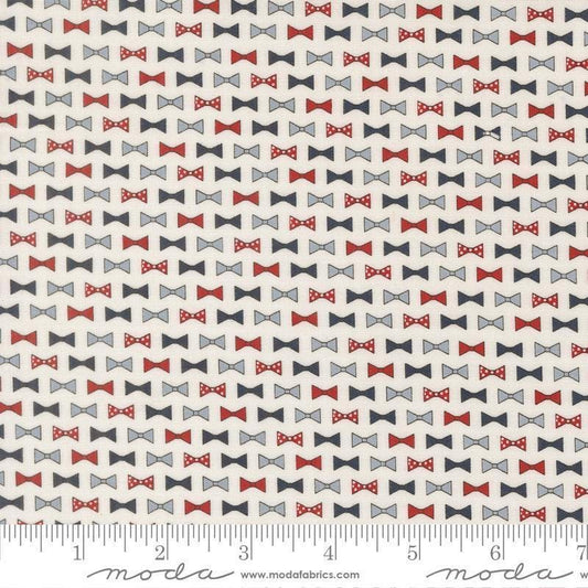 Independence Day Bowties Vanilla quilting cotton fabric by Sweetwater for Moda Fabrics. Features bowties on a white background. Cute Little Fabric Shop.