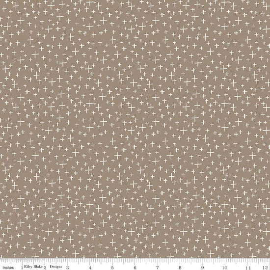 Image of Leo & Savannah Criss Cross Taupe quilting cotton fabric by Deena Rutter for Riley Blake Designs. Features crosses on a brown background. Cute Little Fabric Shop.
