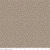 Image of Leo & Savannah Criss Cross Taupe quilting cotton fabric by Deena Rutter for Riley Blake Designs. Features crosses on a brown background. Cute Little Fabric Shop.