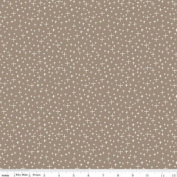 Image of Leo & Savannah Criss Cross Taupe quilting cotton fabric by Deena Rutter for Riley Blake Designs. Features crosses on a brown background. Cute Little Fabric Shop.