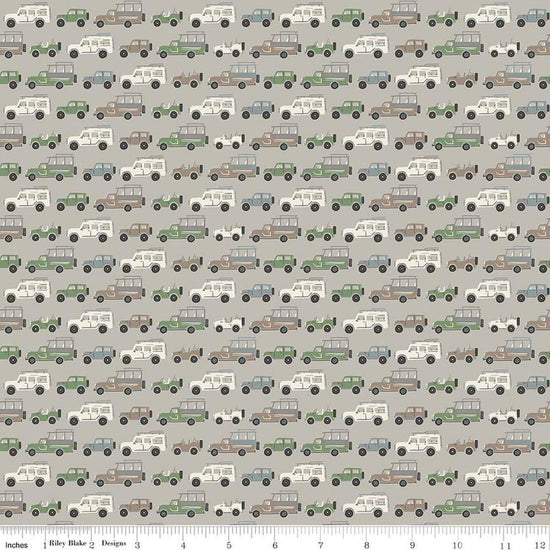 Image of Leo & Savannah Rovers Gray quilting cotton fabric by Deena Rutter for Riley Blake Designs. Features cars on a gray background. Cute Little Fabric Shop.