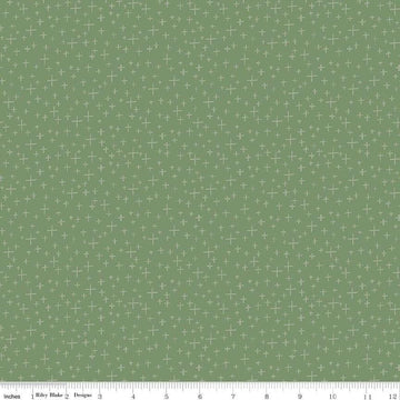 Image of Leo & Savannah Criss Cross Green quilting cotton fabric by Deena Rutter for Riley Blake Designs. Features crosses on a green background. Cute Little Fabric Shop.