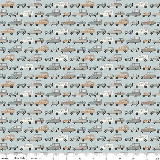Image of Leo & Savannah Rovers Blue quilting cotton fabric by Deena Rutter for Riley Blake Designs. Features cars on a blue background. Cute Little Fabric Shop.