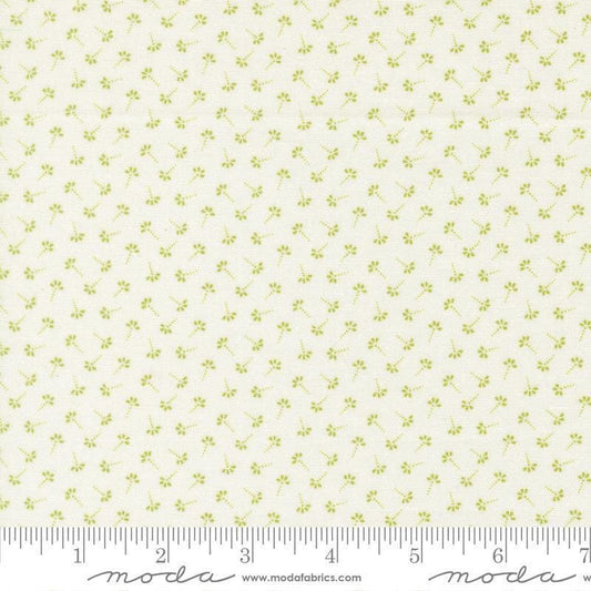 Image of Summers End Dandelion Clover quilting cotton fabric by Fig Tree Co for Moda Fabrics. Features flowers on a cream background. Cute Little Fabric Shop.