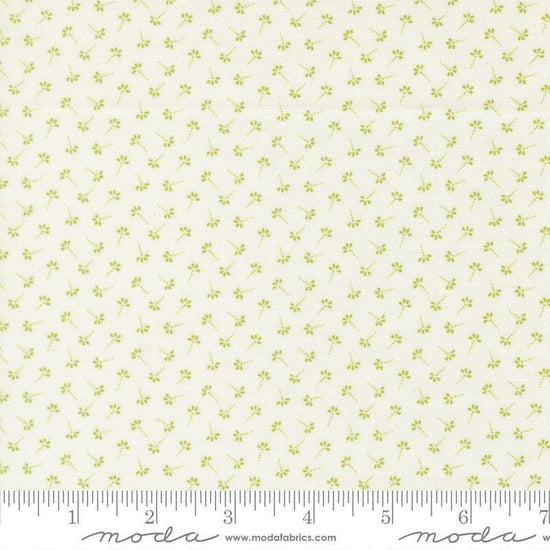 Image of Summers End Dandelion Clover quilting cotton fabric by Fig Tree Co for Moda Fabrics. Features flowers on a cream background. Cute Little Fabric Shop.