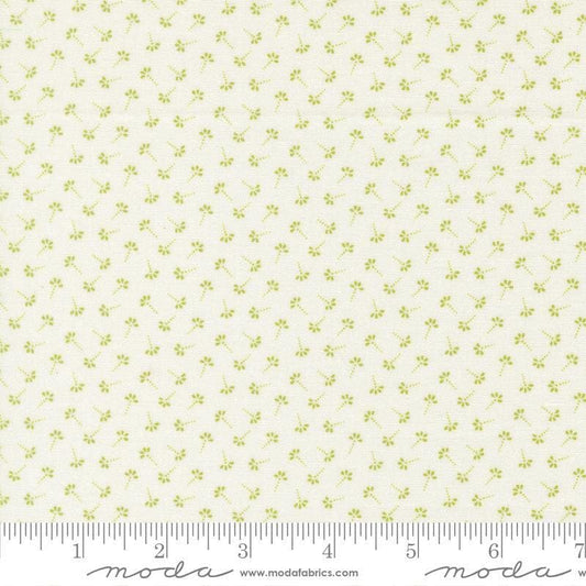 Image of Summers End Dandelion Clover quilting cotton fabric by Fig Tree Co for Moda Fabrics. Features flowers on a cream background. Cute Little Fabric Shop.