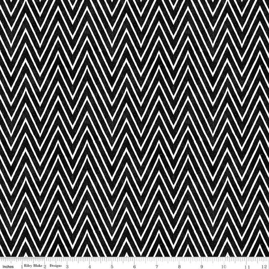Image of Scary Scraps Shocking Chevron Black quilting cotton fabric by J Wecker Frisch for Riley Blake Designs. Features zig zags on a black background. Cute Little Fabric Shop.