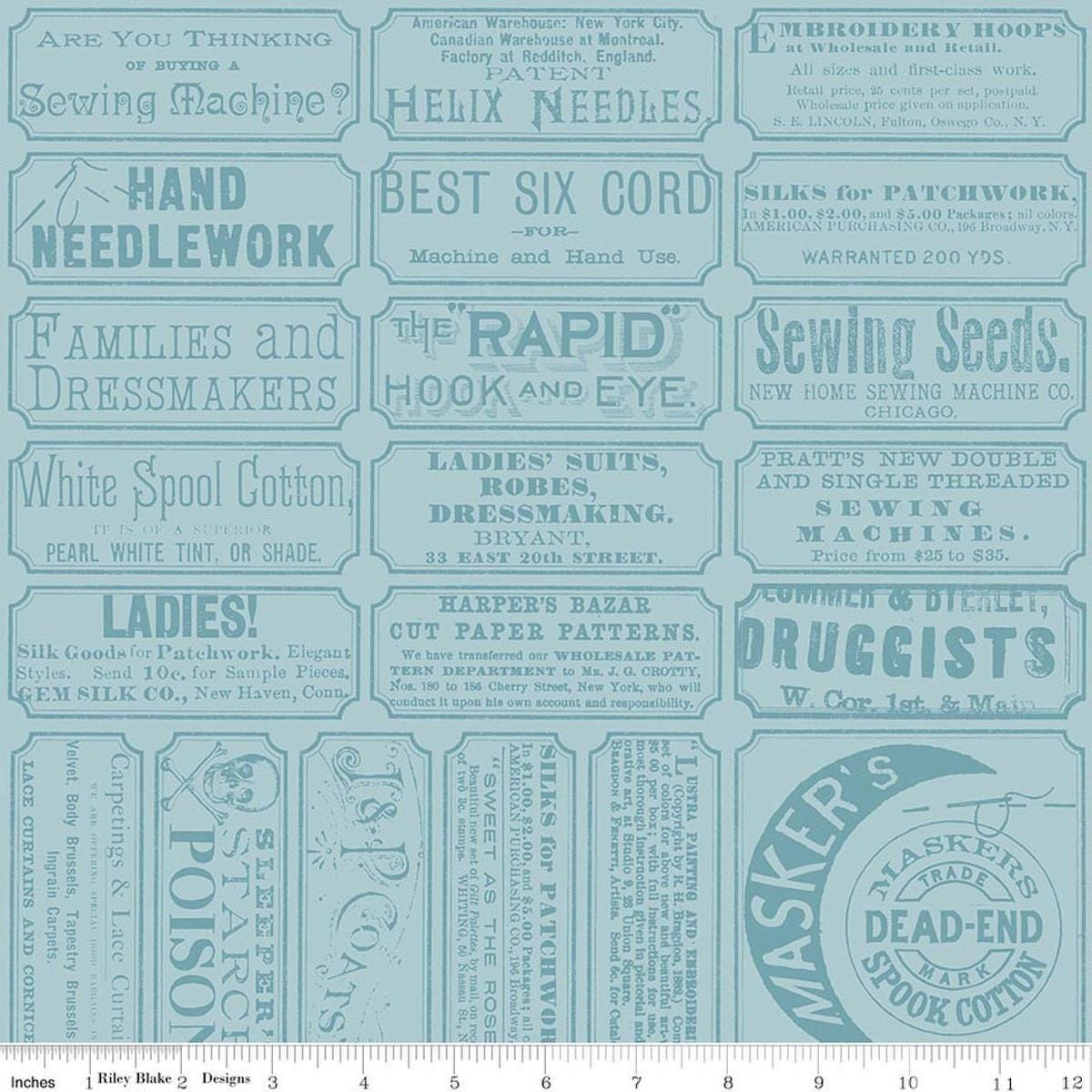 Image of Scary Scraps Scary Sew Labels Blue quilting cotton fabric by J Wecker Frisch for Riley Blake Designs. Features text on a blue background. Cute Little Fabric Shop.