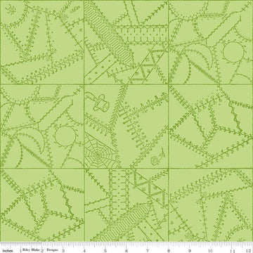 Image of Scary Scraps Crazy Patchwork Green quilting cotton fabric by J Wecker Frisch for Riley Blake Designs. Features a geometric pattern on a green background. Cute Little Fabric Shop.