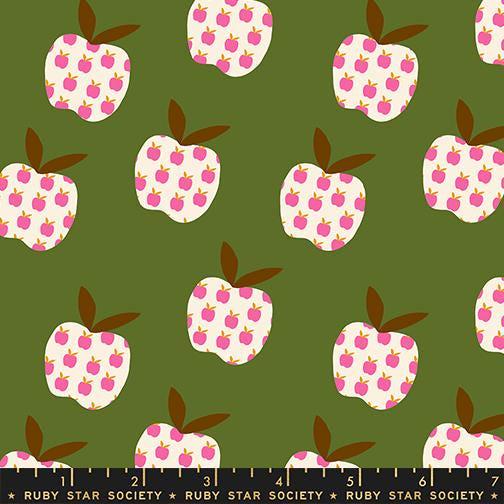 Image of Mystic Fable Apples Neo Pink quilting cotton fabric by Alexia Abegg of Ruby Star Society for Moda Fabrics. Features apples on a green background. Cute Little Fabric Shop.