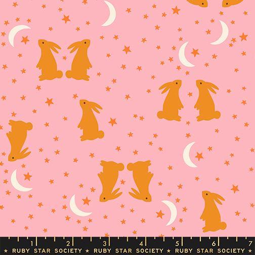 Image of Mystic Fable Bunnies Rosebud quilting cotton fabric by Alexia Abegg of Ruby Star Society for Moda Fabrics. Features bunnies and stars on a pink background. Cute Little Fabric Shop.