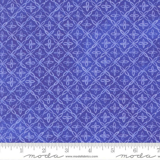 Image of Delphinium Flourish Agapanthus quilting cotton by Janet Clare for Moda Fabrics. Features a geometric pattern on a blue background. Cute Little Fabric Shop.