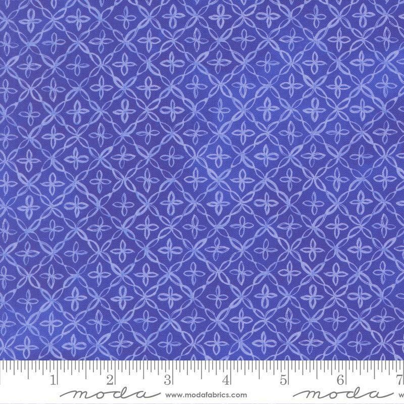 Image of Delphinium Flourish Agapanthus quilting cotton by Janet Clare for Moda Fabrics. Features a geometric pattern on a blue background. Cute Little Fabric Shop.