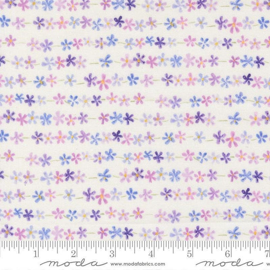 Image of Delphinium Daisy Chain Snowdrop quilting cotton by Janet Clare for Moda Fabrics. Features flowers on a white background. Cute Little Fabric Shop.