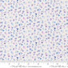 Image of Delphinium Small Floral Snowdrop quilting cotton by Janet Clare for Moda Fabrics. Features flowers on a white background. Cute Little Fabric Shop.