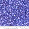 Image of Delphinium Small Floral Agapanthus quilting cotton by Janet Clare for Moda Fabrics. Features flowers on a blue background. Cute Little Fabric Shop.