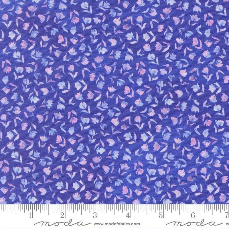 Image of Delphinium Small Floral Agapanthus quilting cotton by Janet Clare for Moda Fabrics. Features flowers on a blue background. Cute Little Fabric Shop.