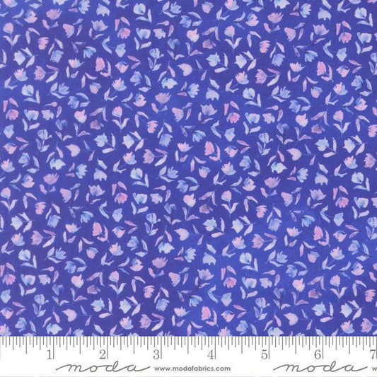 Image of Delphinium Small Floral Agapanthus quilting cotton by Janet Clare for Moda Fabrics. Features flowers on a blue background. Cute Little Fabric Shop.