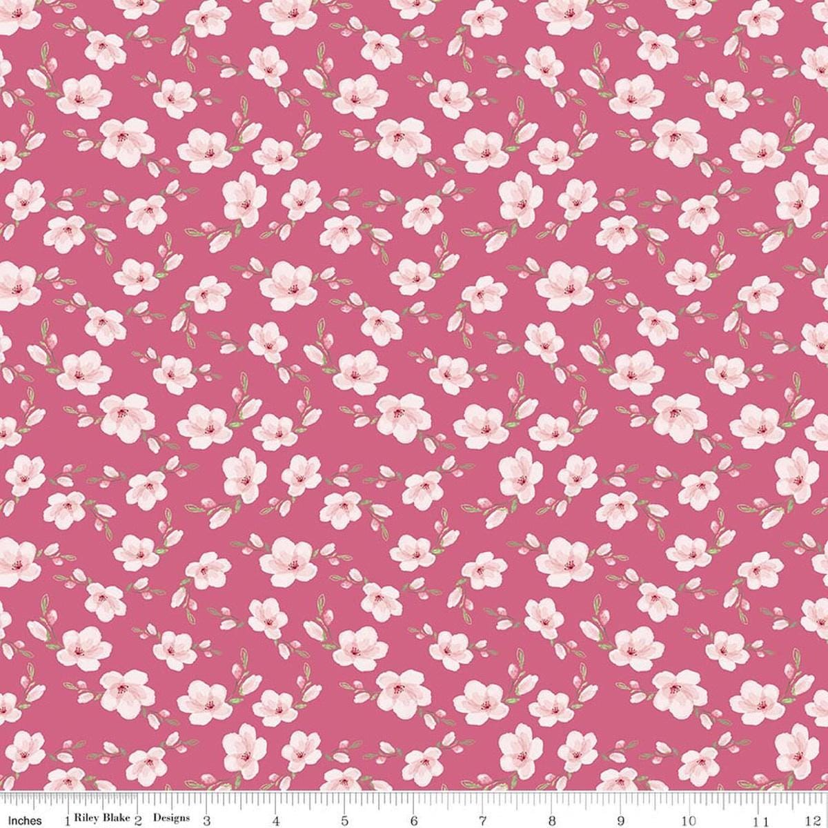 Image of Painted Petals Blossoms Pink quilting cotton fabric by Lila Tueller for Riley Blake Designs. Features flowers on a pink background. Cute Little Fabric Shop.