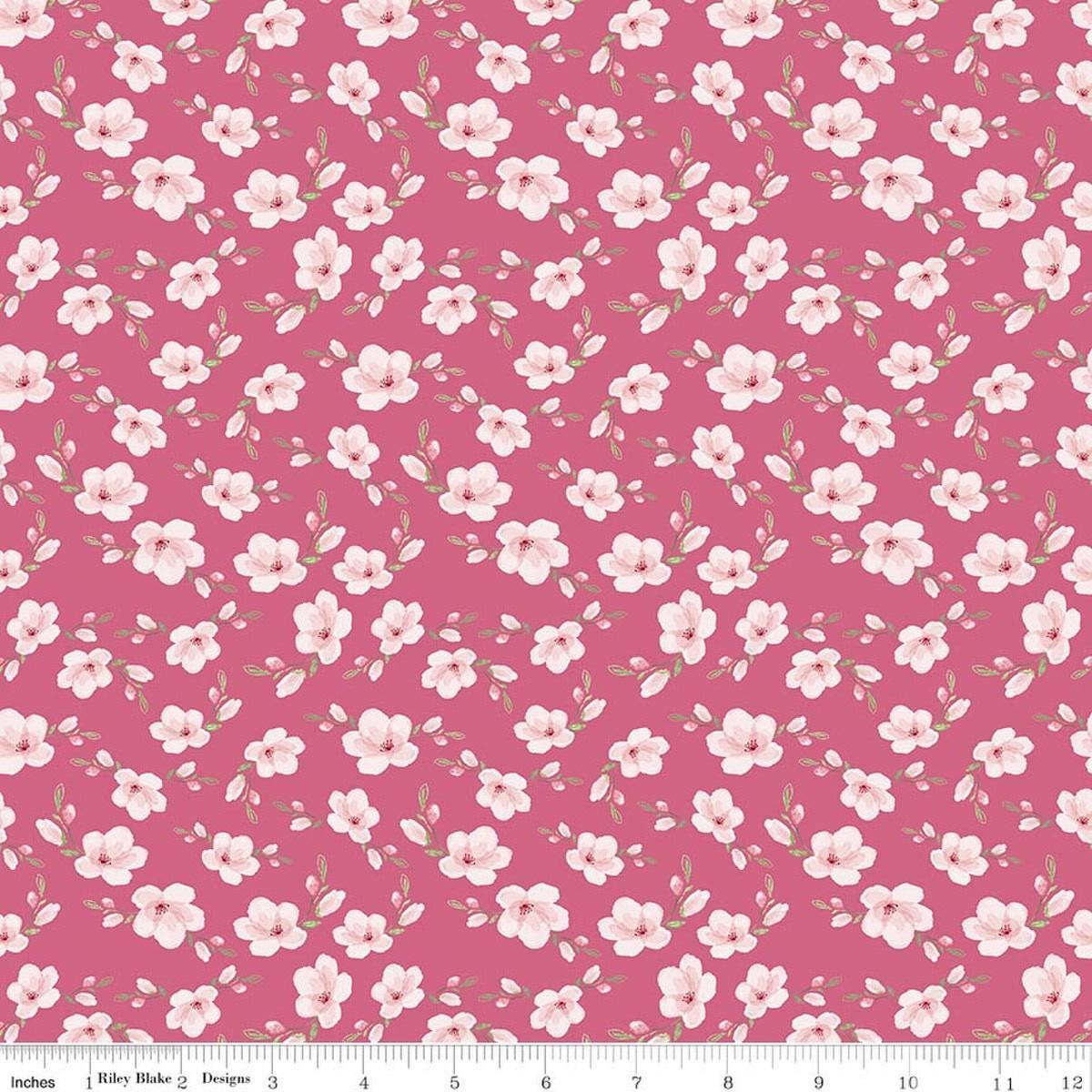 Image of Painted Petals Blossoms Pink quilting cotton fabric by Lila Tueller for Riley Blake Designs. Features flowers on a pink background. Cute Little Fabric Shop.