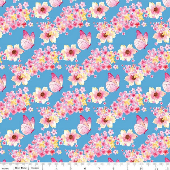 Image of Painted Petals Butterfly Floral Blue quilting cotton fabric by Lila Tueller for Riley Blake Designs. Features flowers on a blue background. Cute Little Fabric Shop.