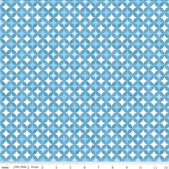 Image of Painted Petals Geo Circles Blue quilting cotton fabric by Lila Tueller for Riley Blake Designs. Features circles on a blue background. Cute Little Fabric Shop.