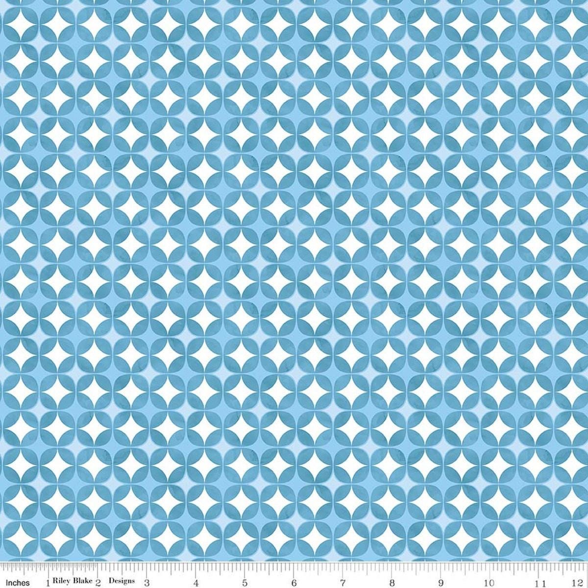 Image of Painted Petals Geo Circles Blue quilting cotton fabric by Lila Tueller for Riley Blake Designs. Features circles on a blue background. Cute Little Fabric Shop.