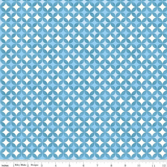 Image of Painted Petals Geo Circles Blue quilting cotton fabric by Lila Tueller for Riley Blake Designs. Features circles on a blue background. Cute Little Fabric Shop.