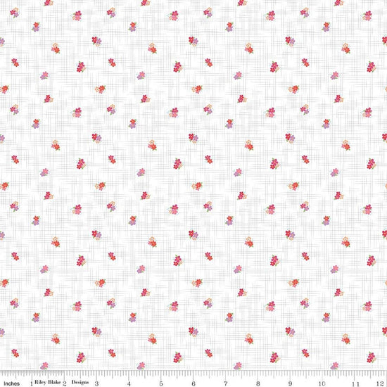 Image of Flourish Ditsy Hot Pink quilting cotton fabric by Sue Daley for Riley Blake Designs. Features flowers on a white background. Cute Little Fabric Shop.