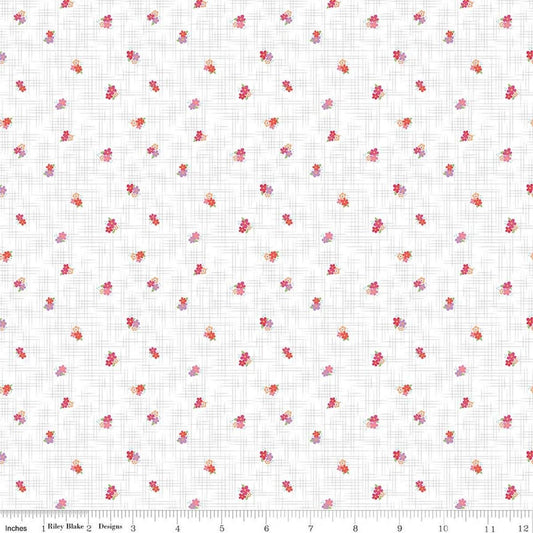 Image of Flourish Ditsy Hot Pink quilting cotton fabric by Sue Daley for Riley Blake Designs. Features flowers on a white background. Cute Little Fabric Shop.
