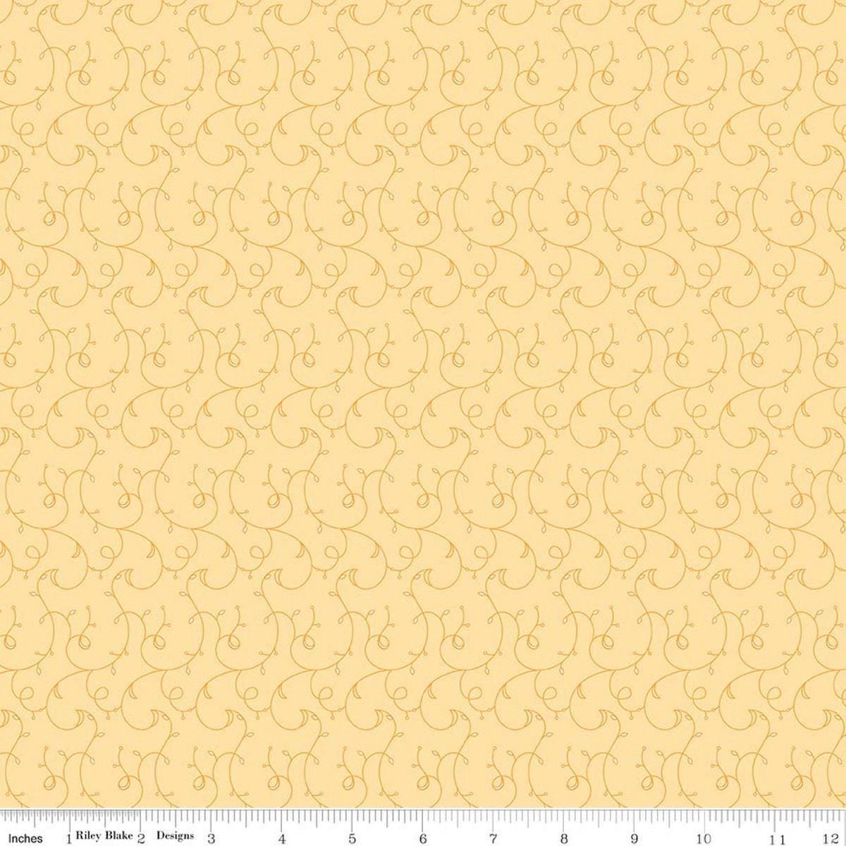 Image of Flourish Vines Lemon quilting cotton fabric by Sue Daley for Riley Blake Designs. Features leaves and vines on a yellow background. Cute Little Fabric Shop.